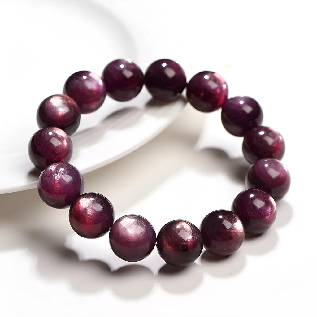 Purple lepidolite crystal round bead bracelet showing polished geometry beads in natural mineral colour
