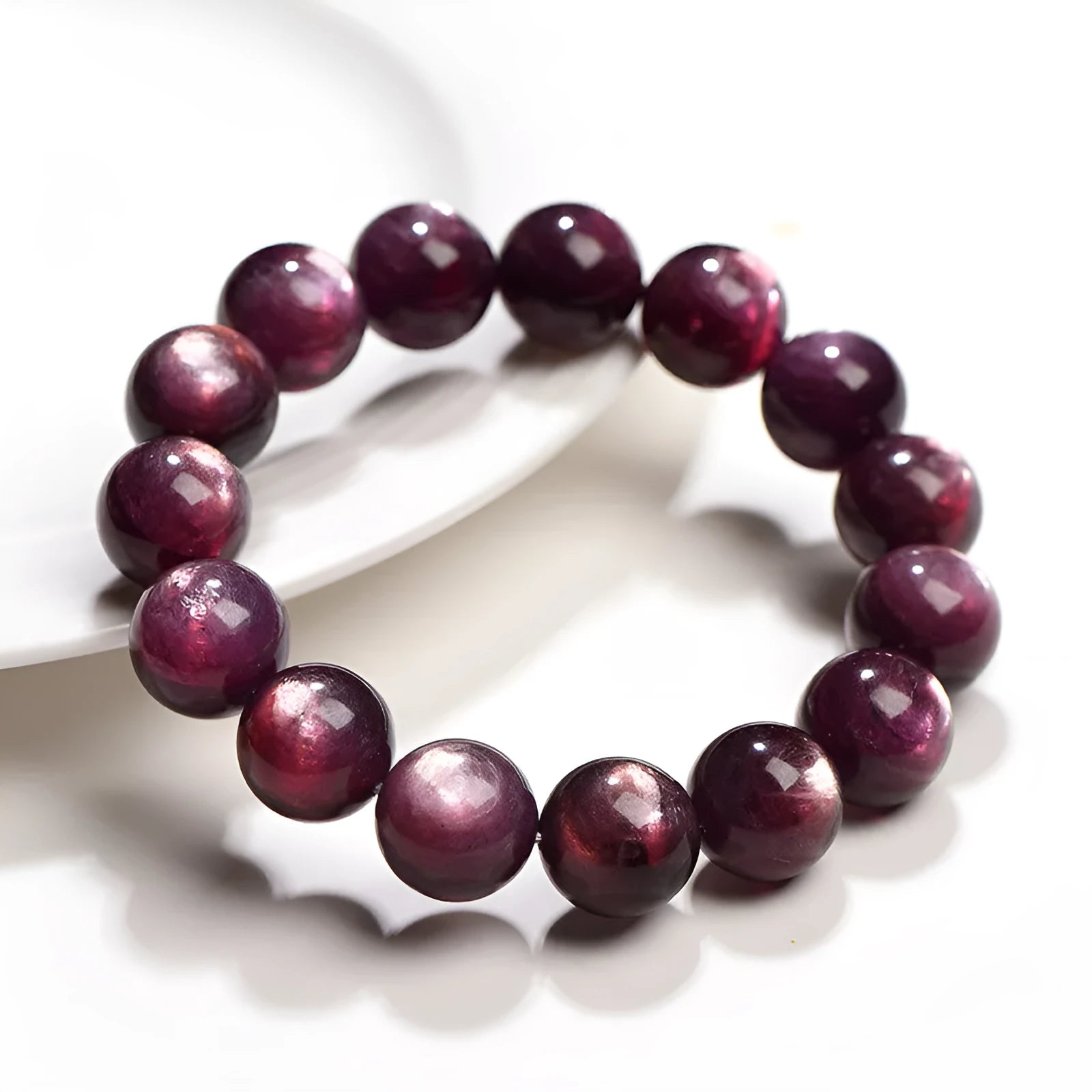 Purple lepidolite crystal round bead bracelet showing polished geometry beads in natural mineral colour