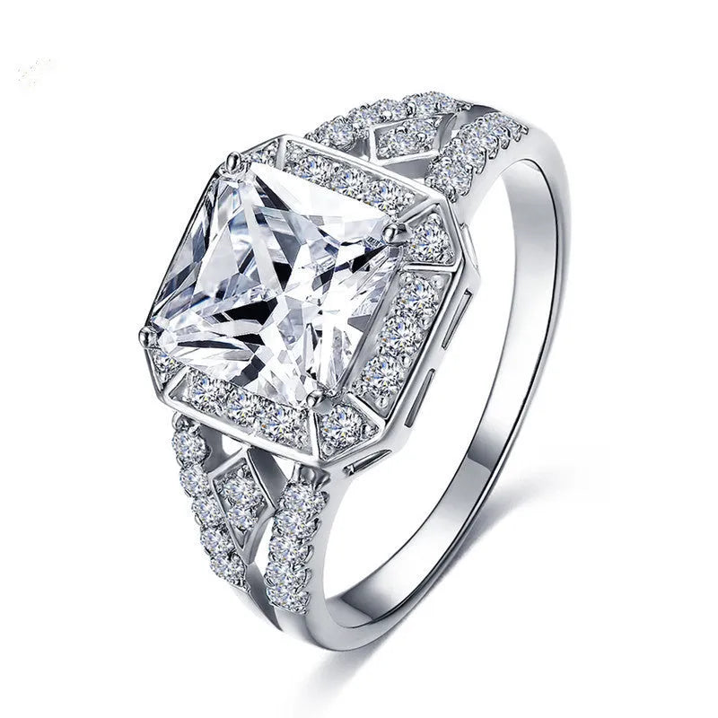 Geometric zircon women's ring with hollow ornament design in platinum colour