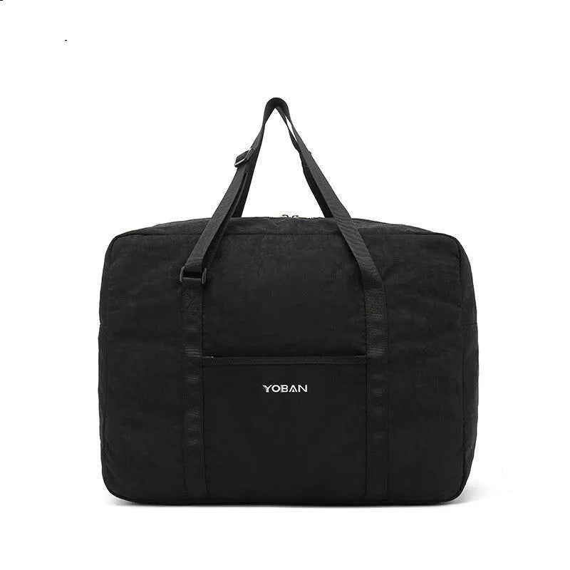 Large waterproof foldable travel bag in black with 20-35L capacity and zipper closure