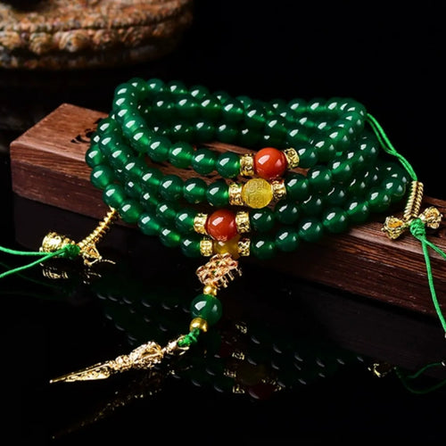 Handmade multi-strand bracelet made with round green agate beads from Brazil