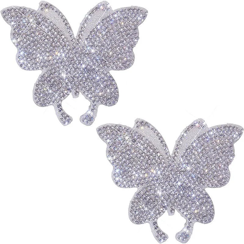 Glass diamond-encrusted car sticker with bear claw and butterfly design, 7 cm by 6 cm.