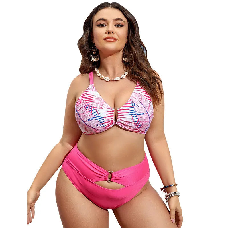 Plus size pink floral bikini with adjustable straps on mannequin showing front view