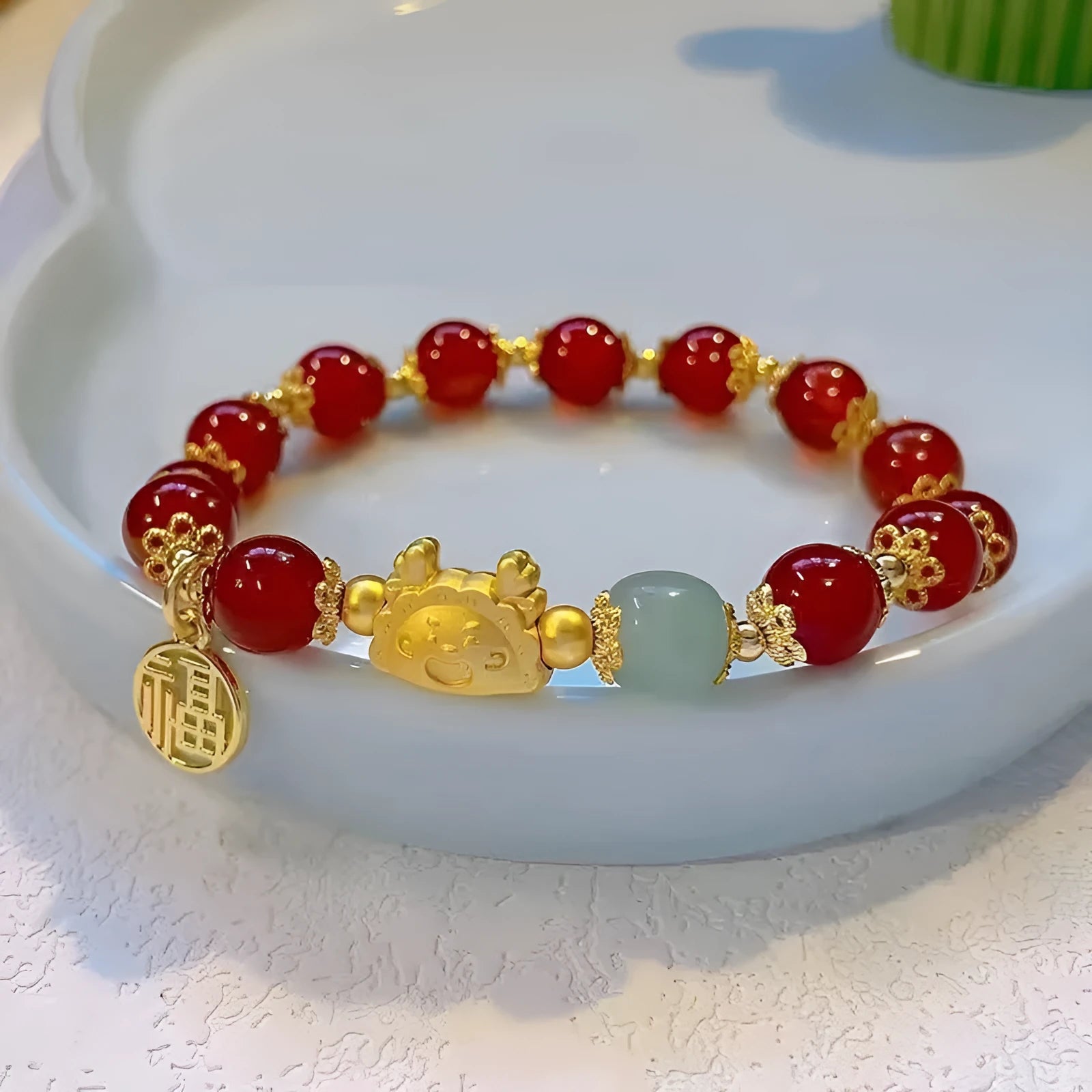 Women's floral glazed zodiac animal bracelet with glass beads in red, pink and white colours