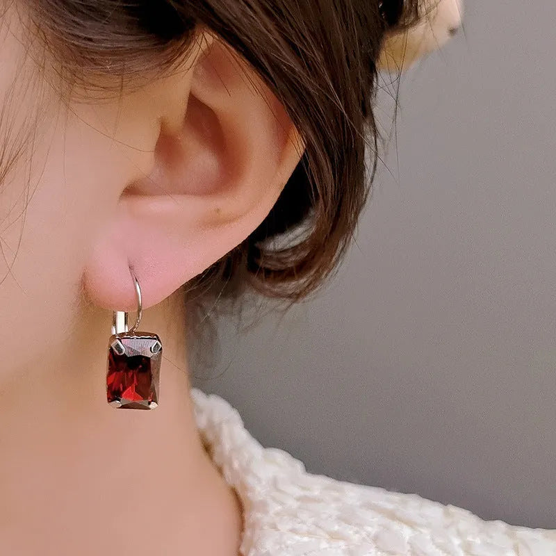 Square copper fashion earrings with crystals in purple, red and yellow colours