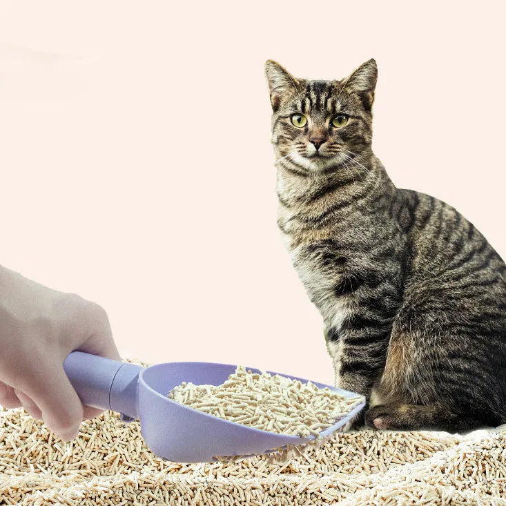 White ABS plastic cat litter scoop with storage base and hidden waste bag compartment