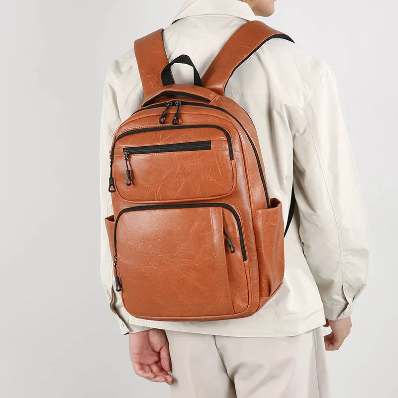 Large capacity men's business commute backpack in black, PU material, multi-space design, curved shoulder strap
