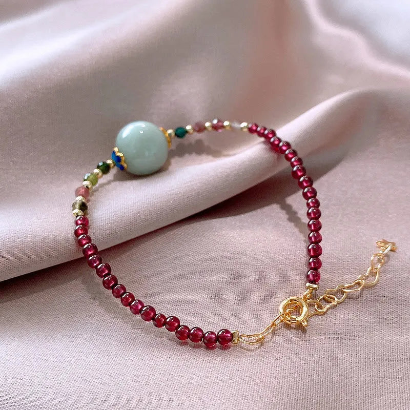 Aquamarine colour tourmaline bracelet with drop shape gemstones and Korean-style design