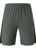 Men's forest green five-point spandex casual shorts laid flat.