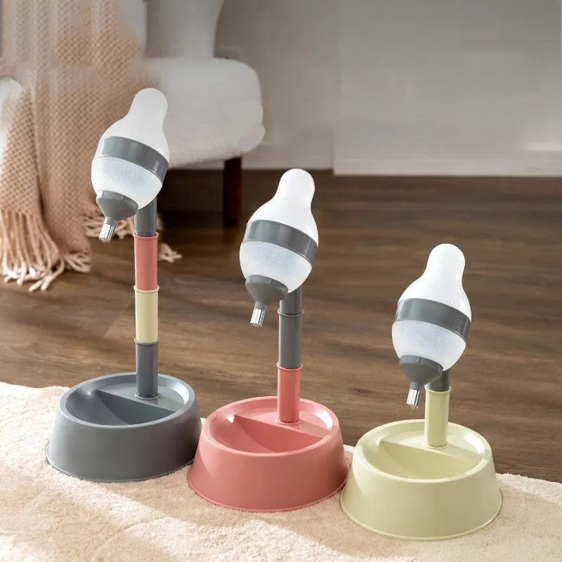 Green adjustable pet standing water dispenser with detachable pole and bowl on a grey floor.