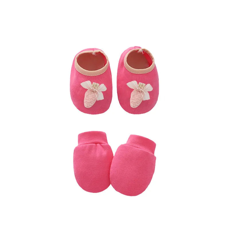 Cotton baby gloves and foot cover set in multiple colours including light blue, navy blue, pink, and camel