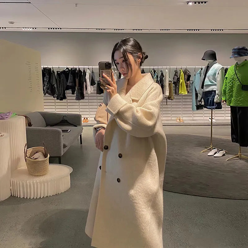 Women's high-grade woolen coat long sleeve in black colour, conventional sleeve design for casual winter wear