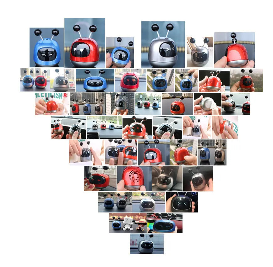 Robot-shaped car vent aromatherapy air freshener diffuser in blue, grey, or red.