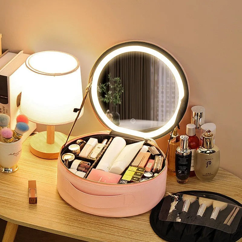 Round smart LED makeup bag with integrated mirror lights in cherry blossom pink colour with lattice partitions visible