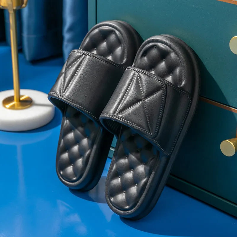 Pair of soft EVA non-slip bathroom slippers with a thick sole, shown in a choice of colours.