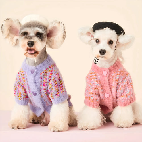 Female dog wearing a colourized wool pet cardigan in pink with a vest-style fit, side view