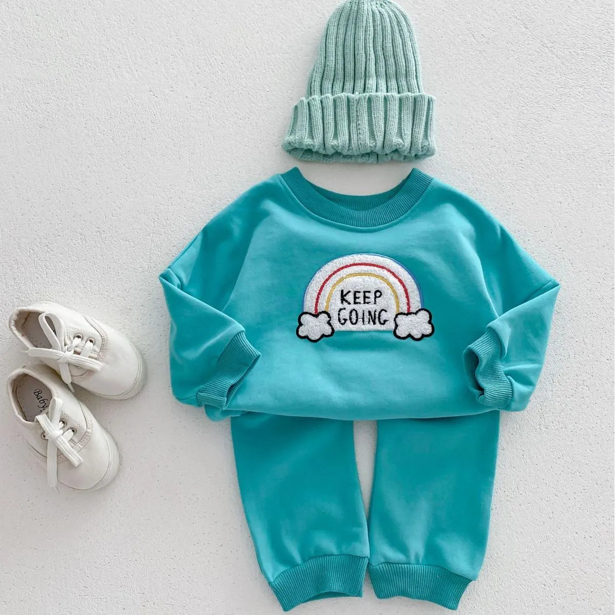Children's rainbow sweater two-piece set in beige with cartoon and flower patterns, cotton pullover top and trousers for toddlers
