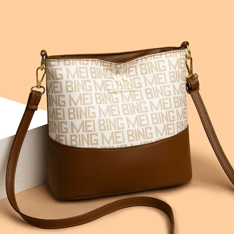 Brown soft PU leather messenger bag with organisation compartments and urban simplicity design