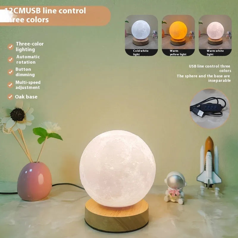 Rotating three-colour moon night light on a wooden base, showing 12cm, 15cm, and 18cm size options.
