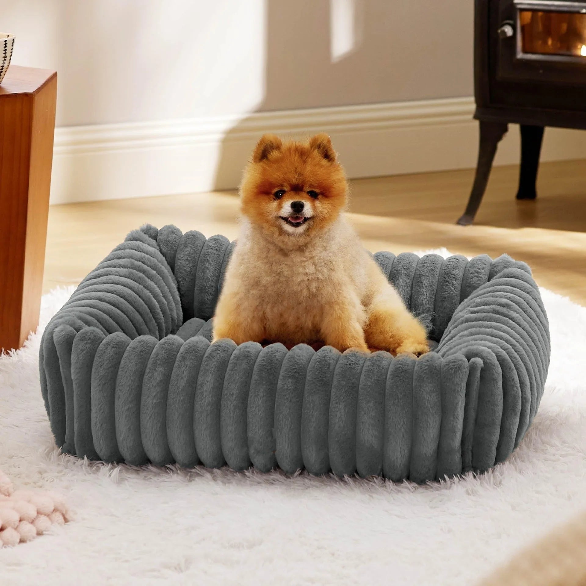 Rectangular orthopaedic dog bed with raised edges in beige colour showing high-density foam filling