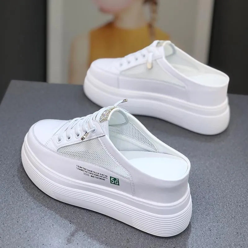 White women's mesh platform shoes with round toe and rubber sole.