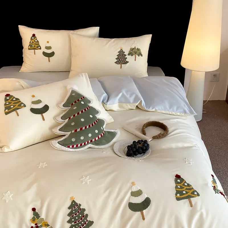 Pure cotton four-piece bed set with embroidered Christmas tree pattern in cream blue and green colours.