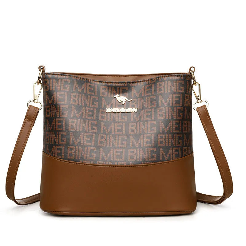 Brown soft PU leather messenger bag with organisation compartments and urban simplicity design