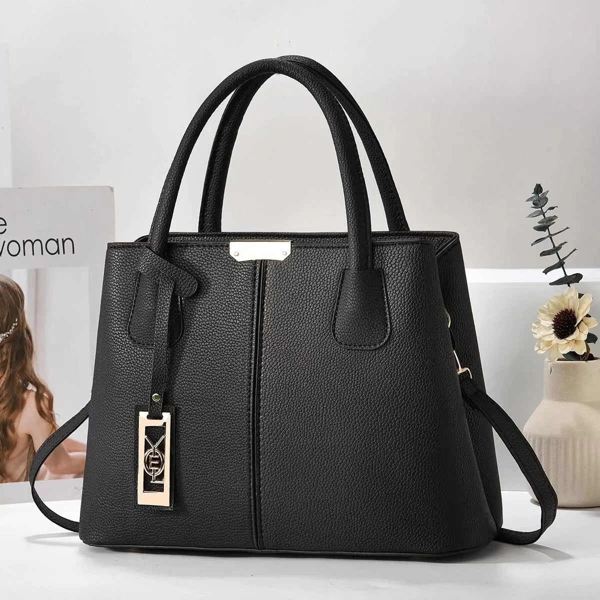 Women's large capacity shoulder bag in soft PU leather with adjustable strap and multiple colour options