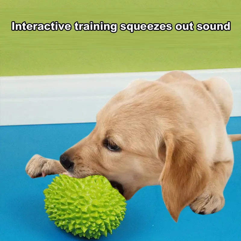 Durian-shaped dog chew toy in yellow with squeaker and tooth cleaning ridges