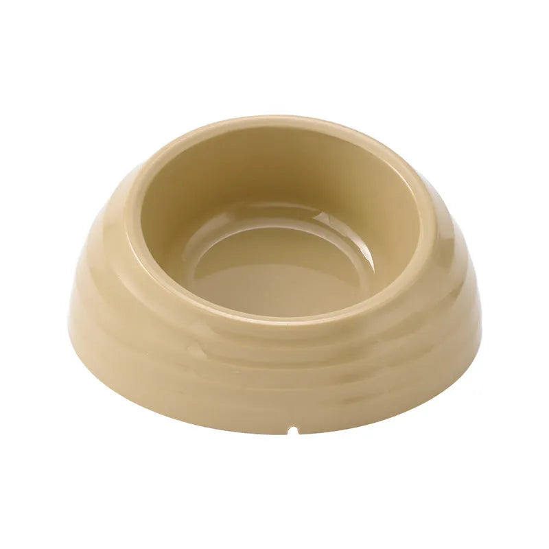 Stainless steel cat bowl on a plastic base in a choice of beige, brown, or light green.