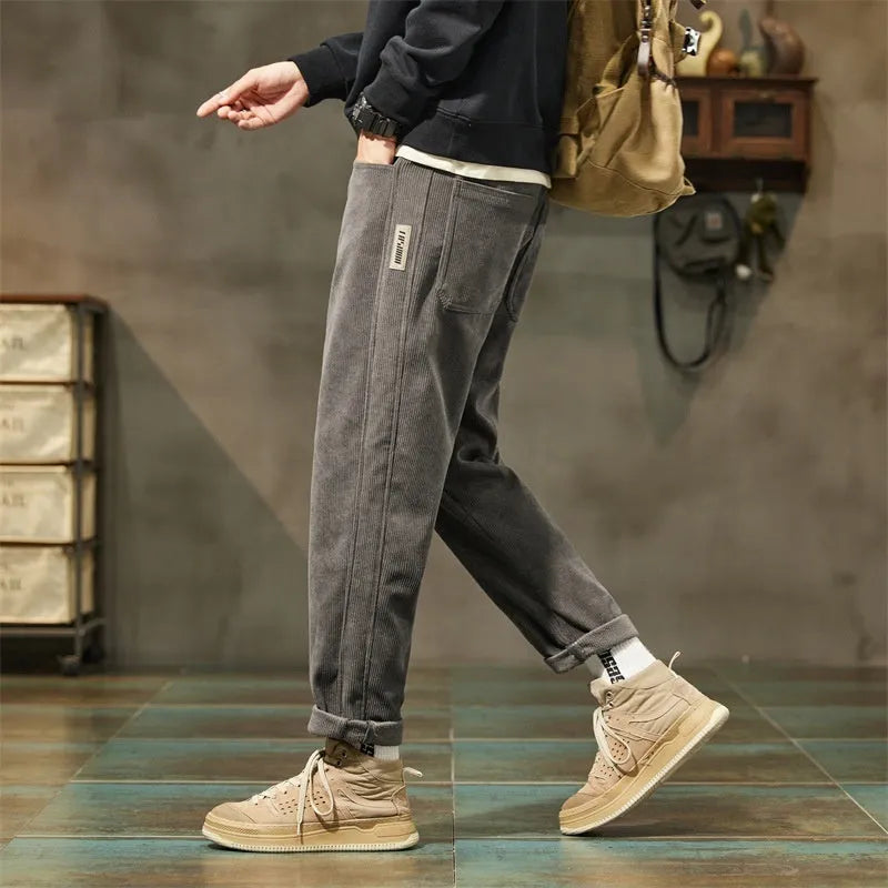Corduroy men's casual trousers with straight leg and tapered street fashion styling