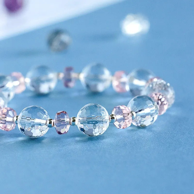 White crystal bracelet for women with diamond shapes and lucky cat charm