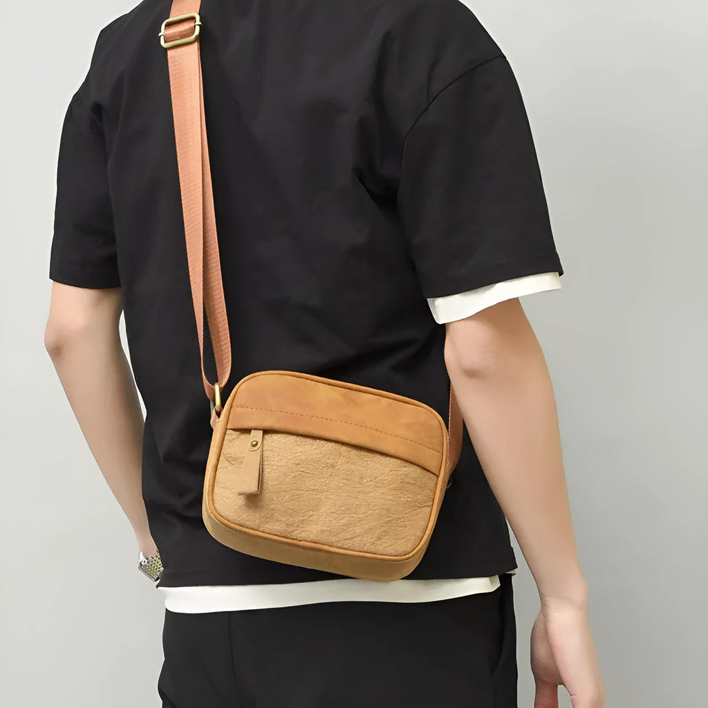 Men's retro-style crossbody bag made from paper material in a choice of colours.