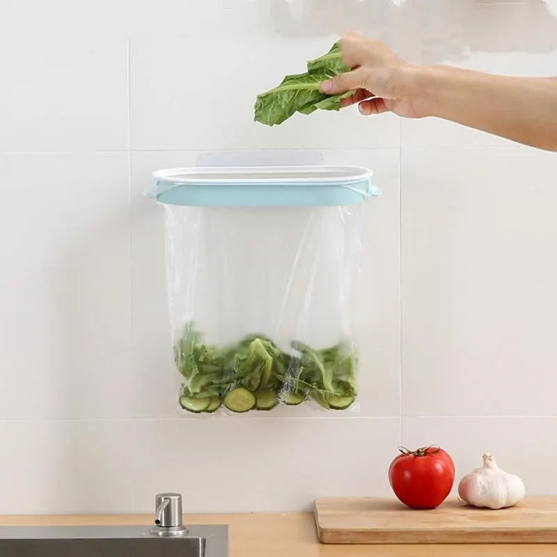 Blue plastic kitchen rubbish bag storage rack with open bench t frame design on a worktop.