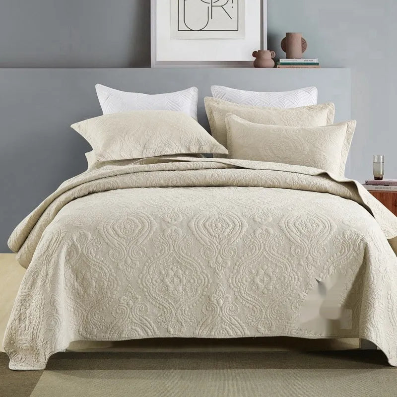 Pure cotton bed cover three-piece set shown in a light colour on a bed, featuring a quilt cover and sheet.