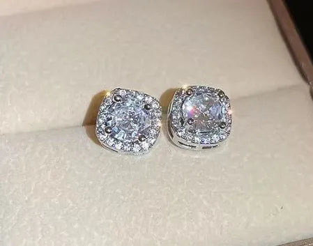 A pair of square geometric women's earrings with a diamond-treated surface in a gold colour option.