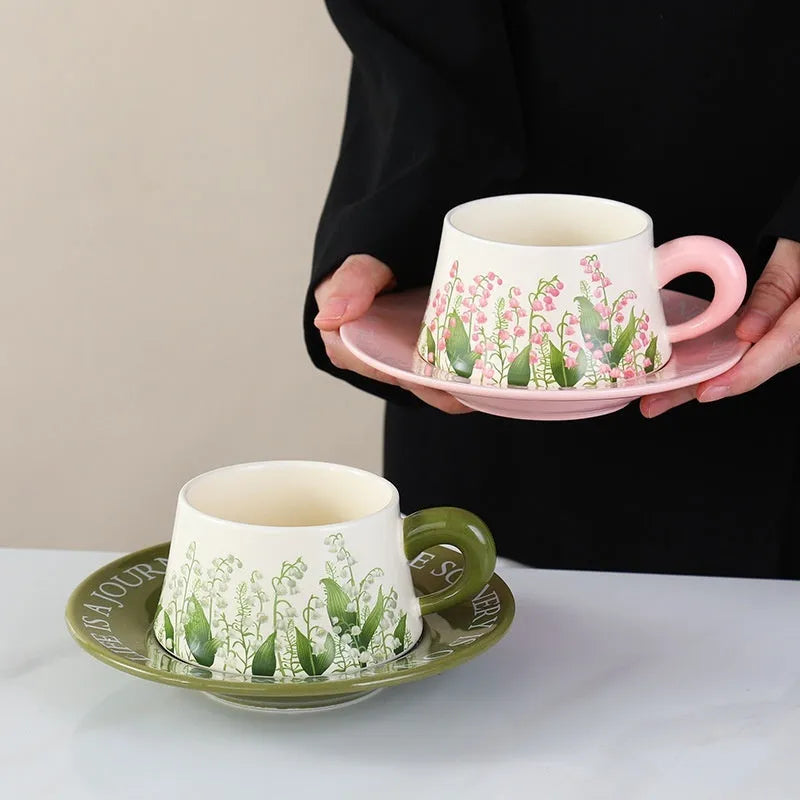 Ceramic coffee cup set with two 300ml cups, saucers, and spoons in couple designs
