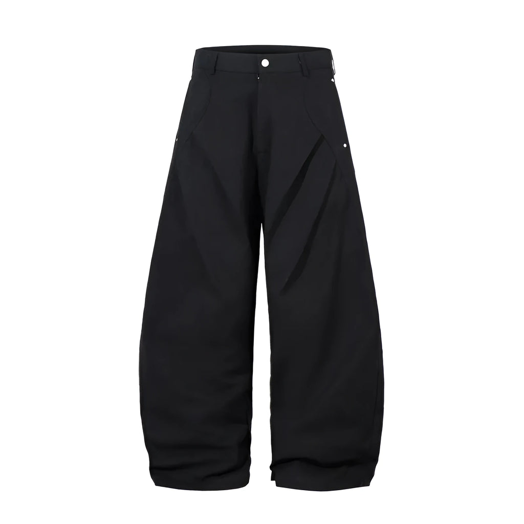 Black men's pleated casual trousers with a loose wide-leg fit on a hanger