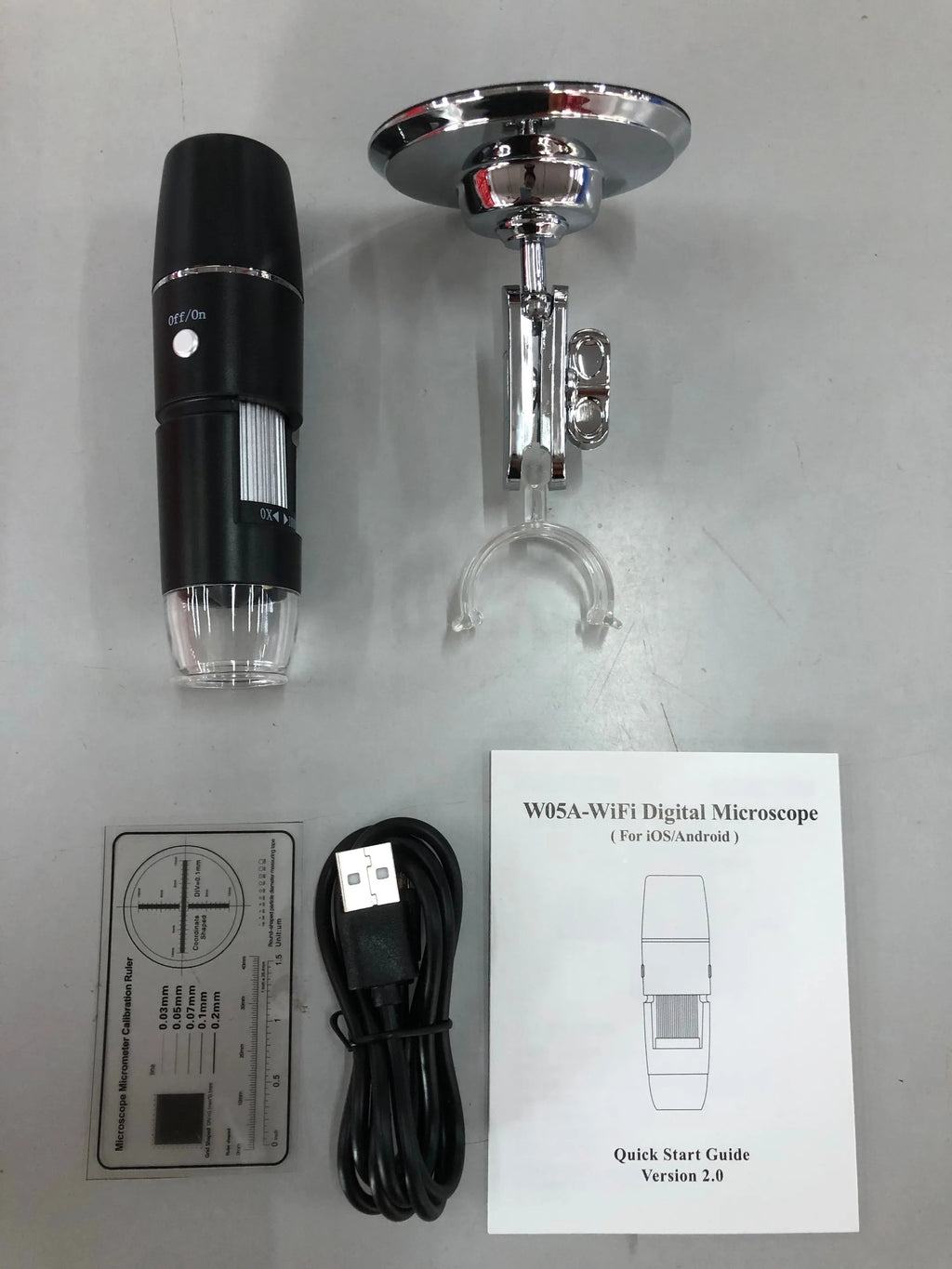Black microscope magnifier camera phone bracket with 8 LED lights and 1.5m cable on white background