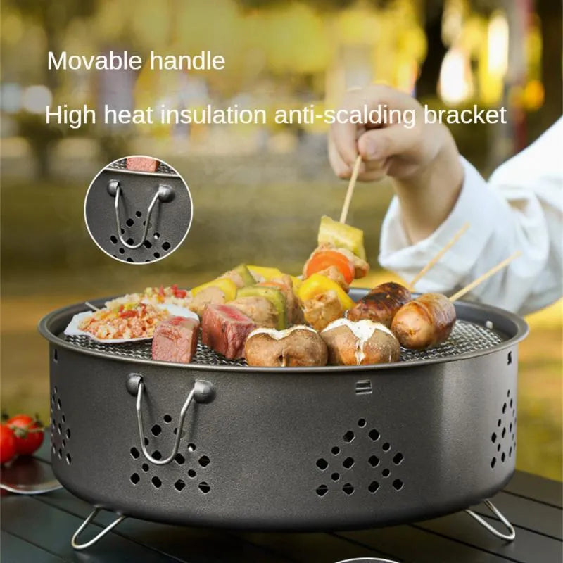 Portable stainless steel campfire grill with detachable parts and storage bag on grass