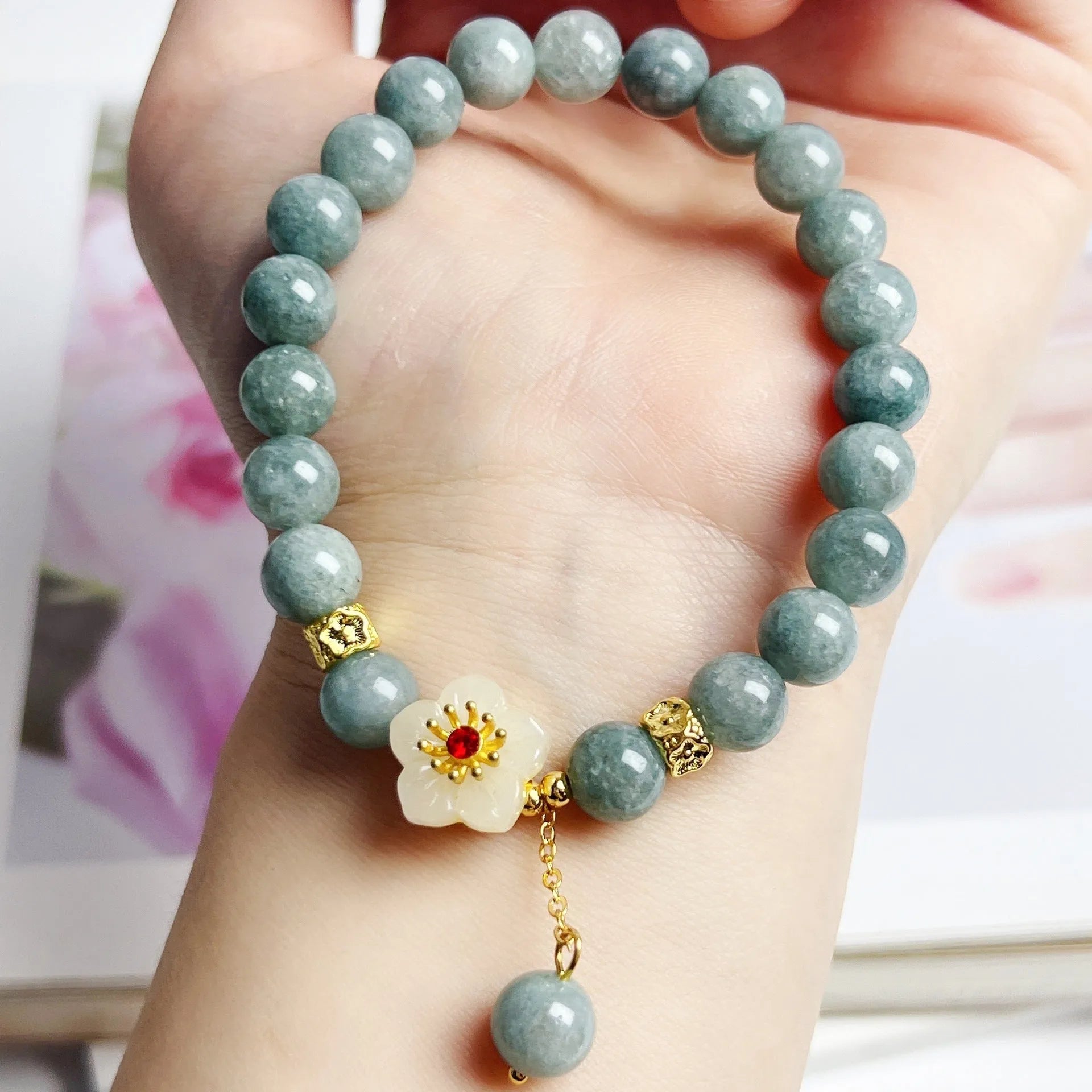 Women's handmade jade bracelet with adjustable rope fastening in retro style