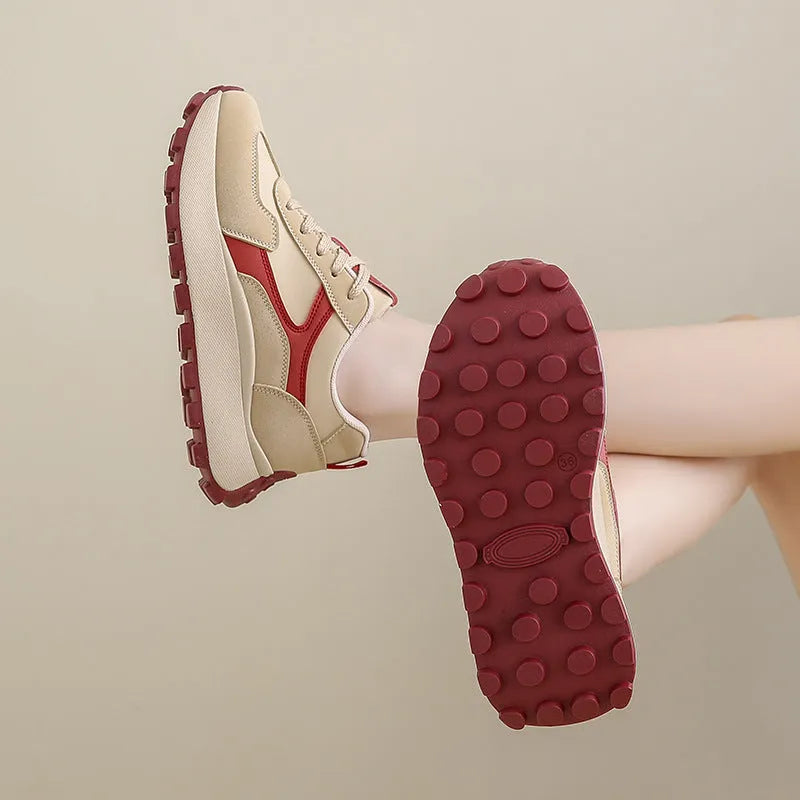 Women's low-top platform sports shoes in three colours with a lace-up front and flat rubber sole.