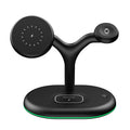 Black magnetic three-in-one 15W fast wireless charging stand with vertical orientation for desktop phone charging