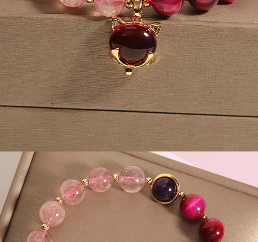 Women's simple strawberry crystal bracelet on an 18cm elastic band.