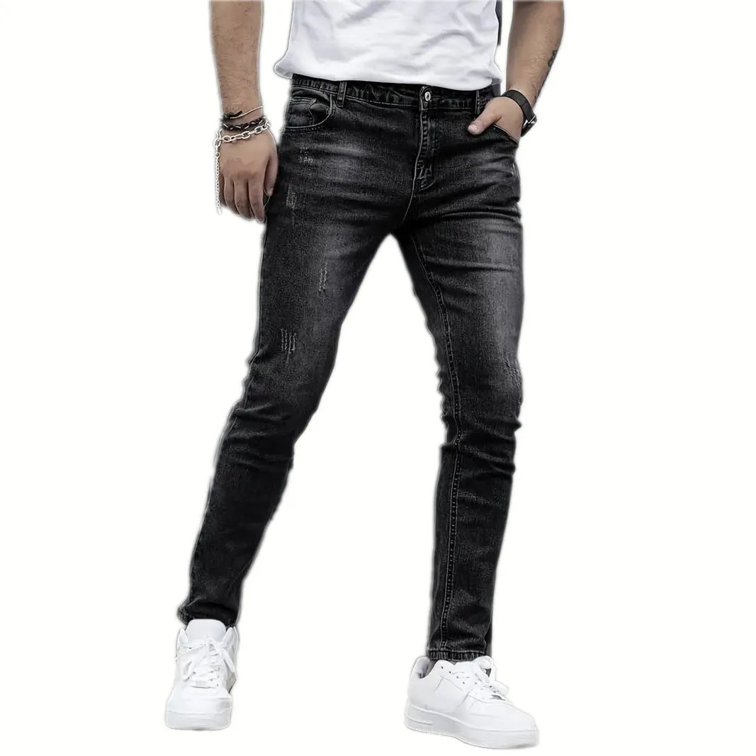 Men's straight leg jeans in stretch cotton denim showing high elasticity fabric and slim silhouette