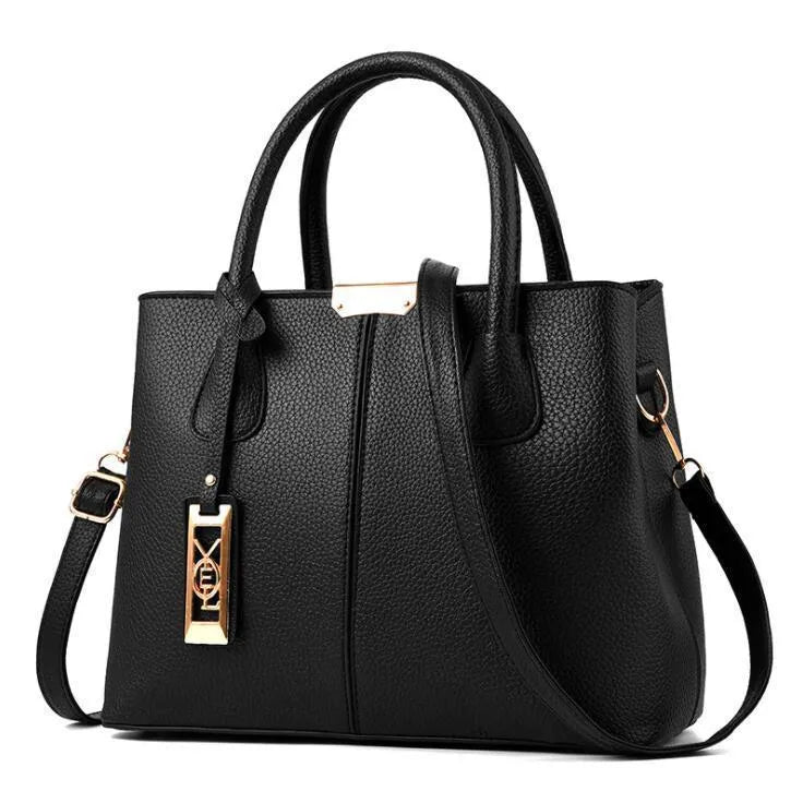 Women's large capacity shoulder bag in soft PU leather with adjustable strap and multiple colour options