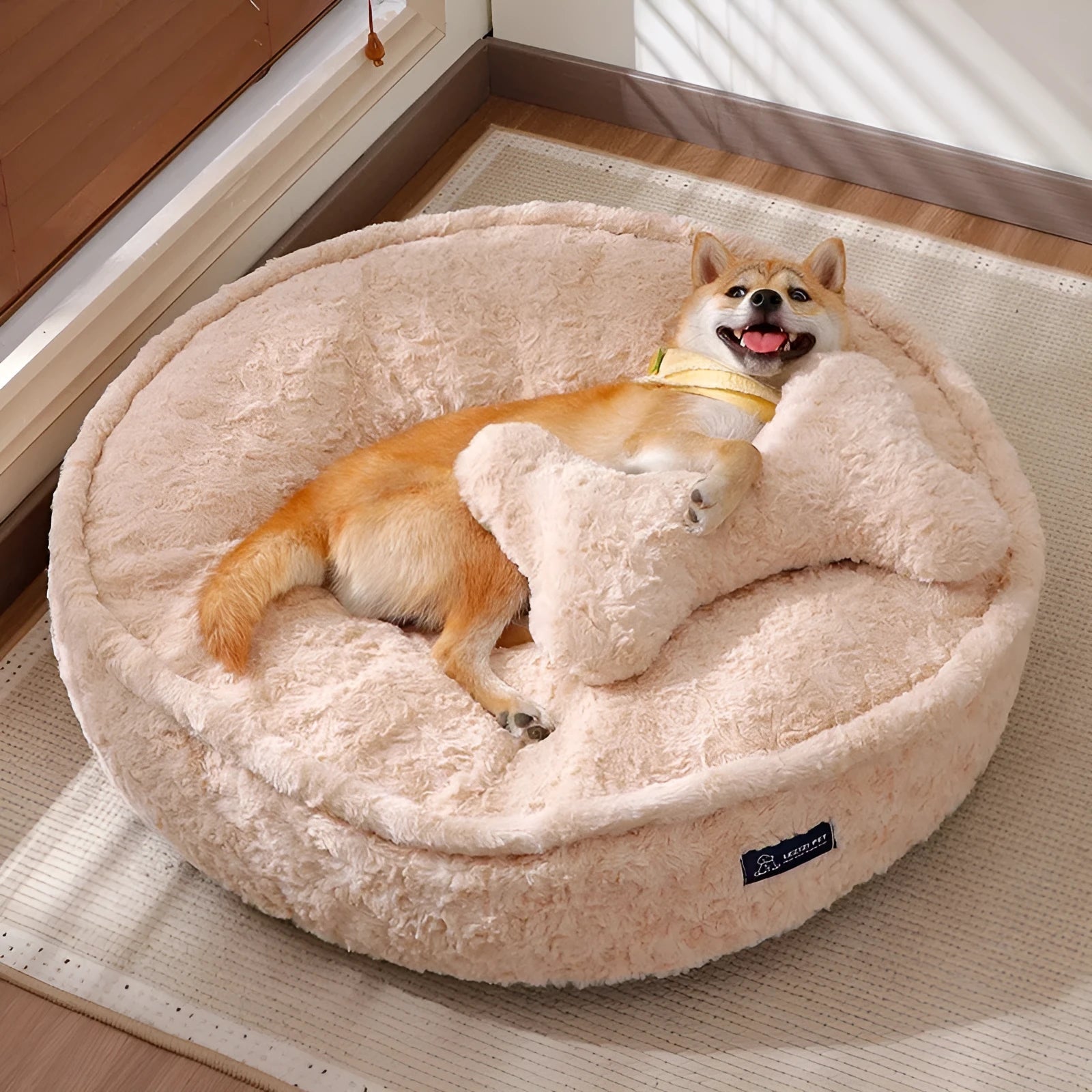Round nest pet bed with removable cloth cover in milk tea colour, shown in various sizes.