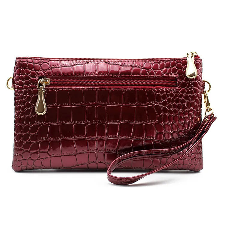 Women's soft PU leather messenger bag in horizontal square design showing black, coffee, and purplish red colour options