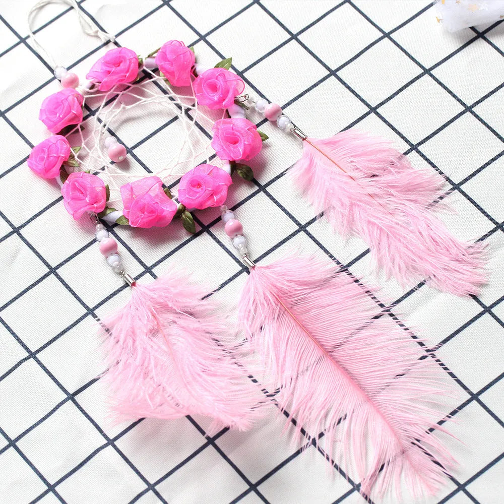 Pink dreamcatcher wind chime wall ornament with ostrich feathers, 10cm diameter
