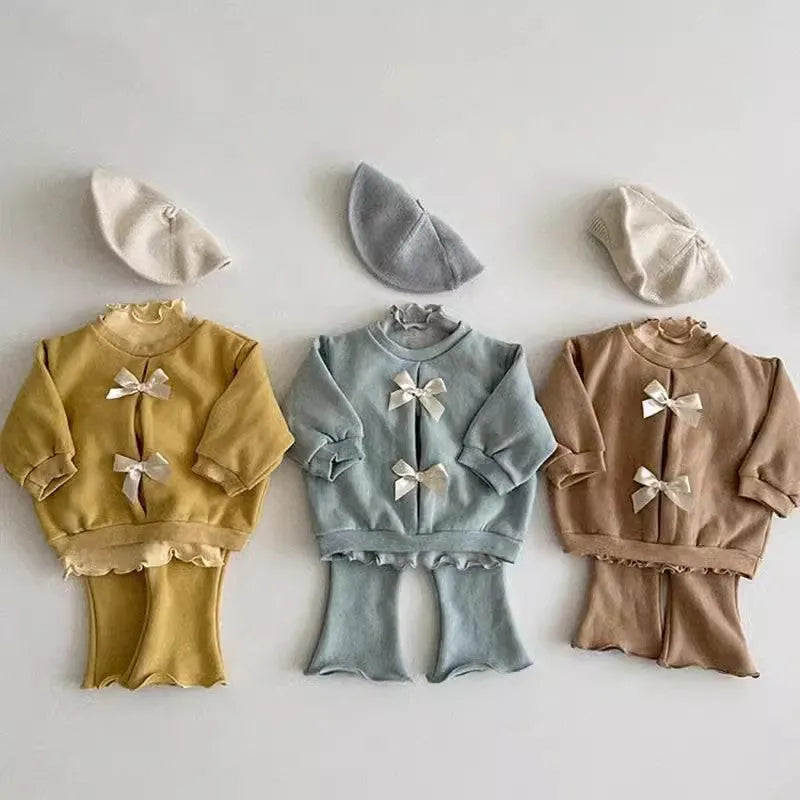 Girls cotton top and pants set in solid colour with wooden ear detail and matching hat